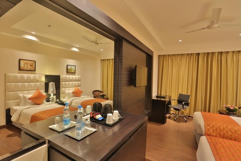 Una Smart Mandarin Panchkula Room photo